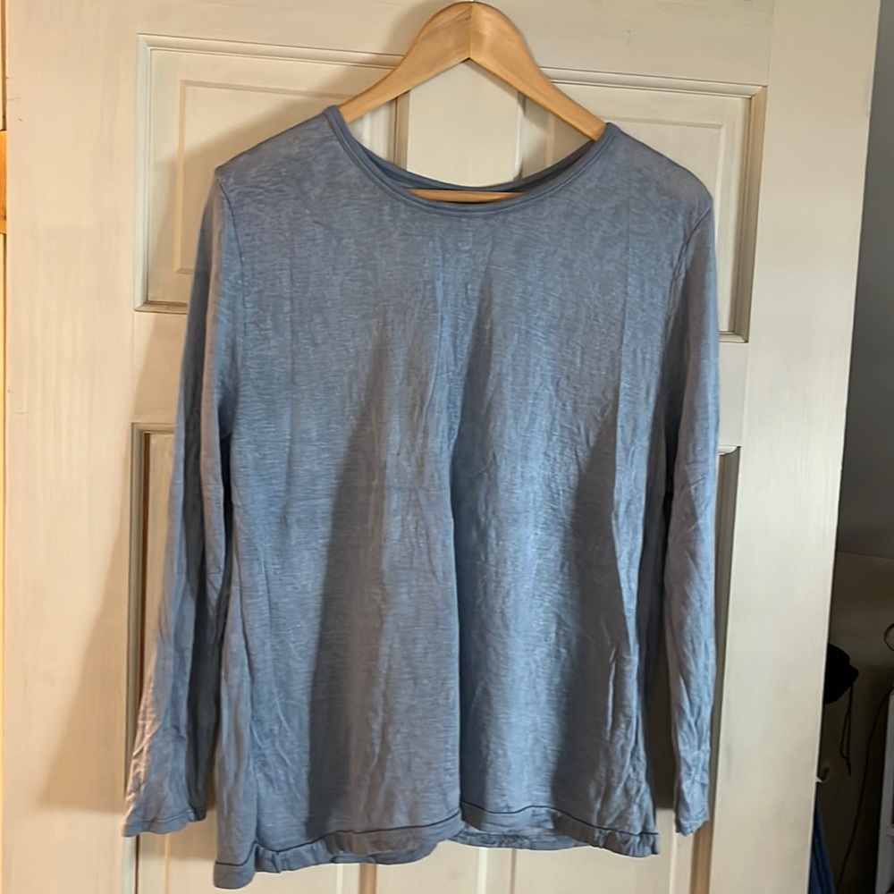 Woman’s versatile cotton light blue top open back with underpinning / shell.
